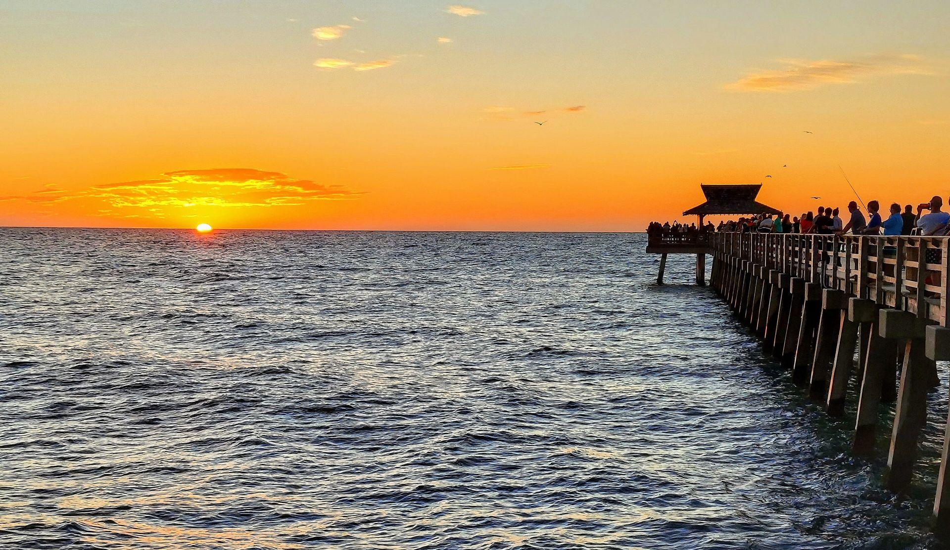 Gulf sunset beside the historic Naples Pier
