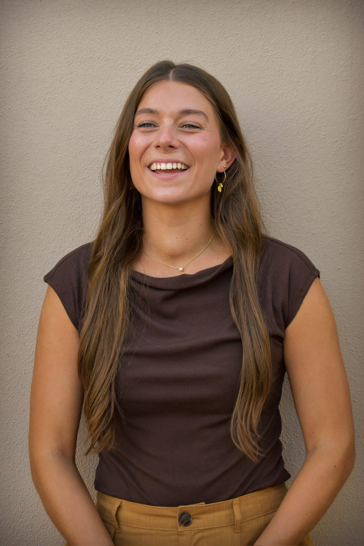 Simone Kohl laughing during a portrait session